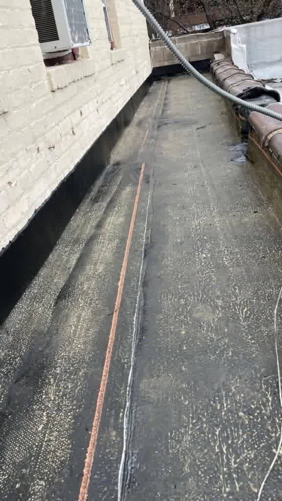 Commercial roof repair in progress in Morristown, New Jersey